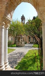Italy. Sicily island. Palermo city. The monastery courtyard (cloister) of San Giovanni degli Eremiti Church in spring