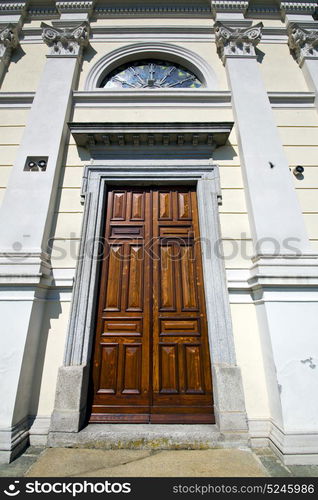 italy sumirago church varese the old door entrance and mosaic sunny daY