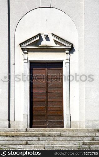italy sumirago church varese the old door entrance and mosaic sunny daY