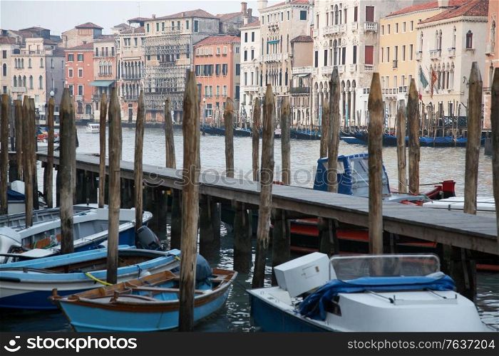 Italy Venice jetty with boats. Venice