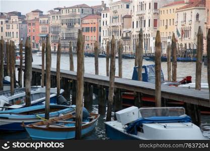 Italy Venice jetty with boats. Venice