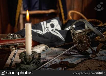 Items from pirated goods randomly laid out on the old ship's table. Pirate still life