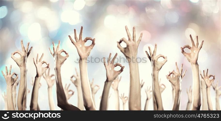 Its gonna be ok. Many of people hands showing ok gesture