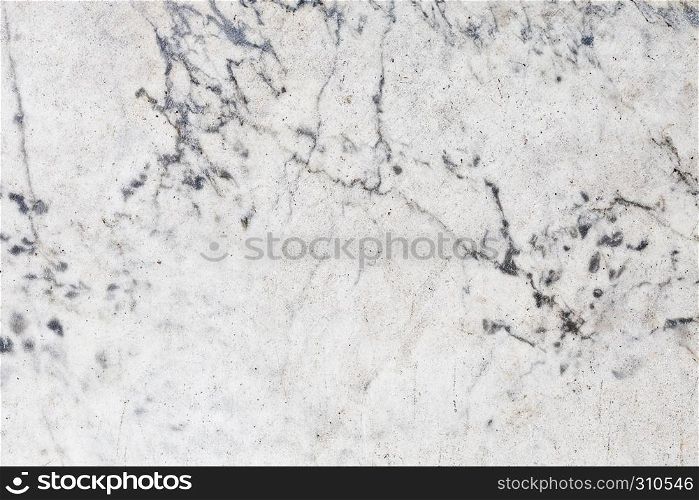 Ivory white marble tile texture background with blue cracks