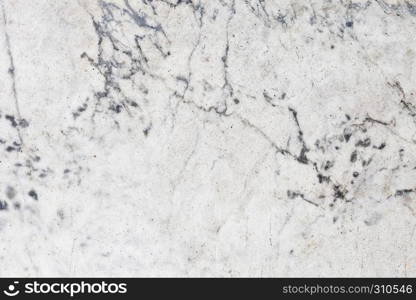 Ivory white marble tile texture background with blue cracks