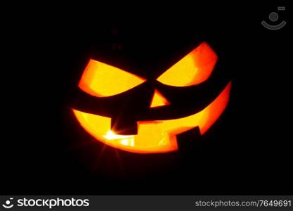 Jack O Lantern halloween pumpkin face isolated on black background. Jack O Lantern halloween pumpkin face