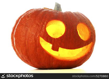 Jack O Lantern halloween pumpkin with candle light inside isolated on white background