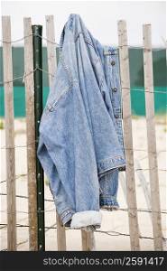 Jacket hanging on a fence