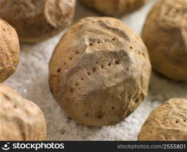 Jacket Potatoes baked on a tray of Sea Salt