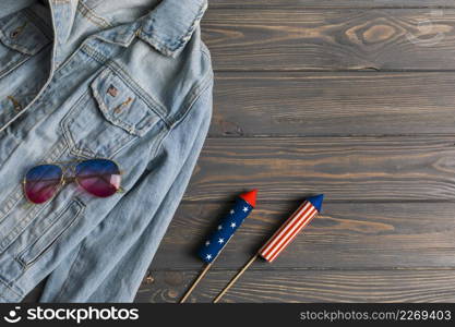 jacket sunglasses fireworks table