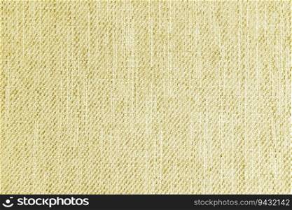 Jacquard woven upholstery, yellow coarse fabric texture. Textile background, furniture textile material, wallpaper, backdrop. Cloth structure close up.