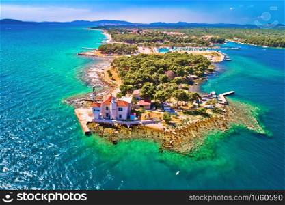 Jadrija lighthouse in Sibenik bay entrance aerial view, archipelago of Dalmatia, Croatia