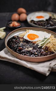 Jajangmyeon or JJajangmyeon is Korean Noodle with Black Sauce - Korean Food Style . Jajangmyeon or JJajangmyeon is Korean Noodle 