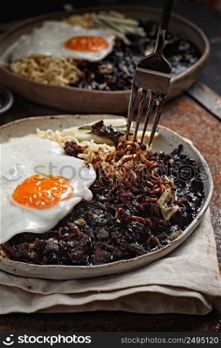 Jajangmyeon or JJajangmyeon is Korean Noodle with Black Sauce - Korean Food Style . Jajangmyeon or JJajangmyeon is Korean Noodle 