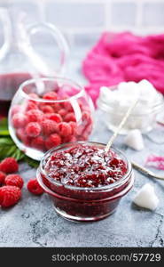 jam from rasspberry in bowl and on a table