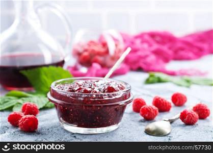 jam from rasspberry in bowl and on a table