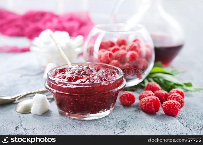 jam from rasspberry in bowl and on a table
