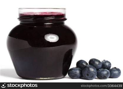 jam jar with blueberry jam and blueberries. jam jar with blueberry jam and blueberries aside on white background