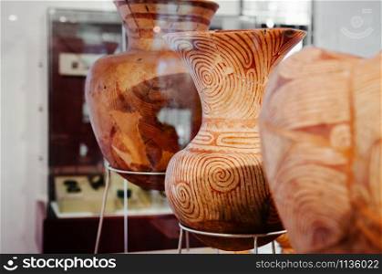JAN 12, 2019 Udon Thani, Thailand - Ancient pottery and prehistory ceramic ware exhibits at Ban Chiang Museum