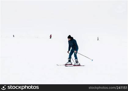 JAN 3, 2018 Kayseri, Turkey : Tourist on Mt. Erciyes ski resort covered with snow in winter on a foggy day