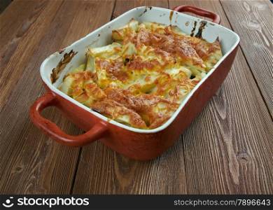 Janssons frestelse - traditional Swedish casserole made of potatoes, onions, pickled sprats