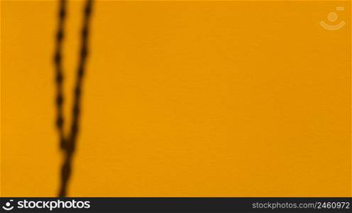 Japa beads shadows on saffron pastel paper. Abstract backgorund. Stock photography.. Japa beads shadows on saffron pastel paper. Abstract backgorund. Stock photo.