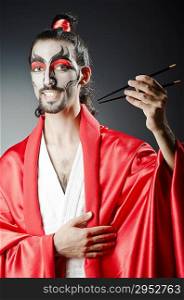 Japanese actor with chopsticks