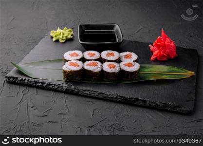 Japanese big maki sushi on black board
