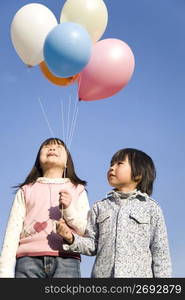 Japanese children having balloons