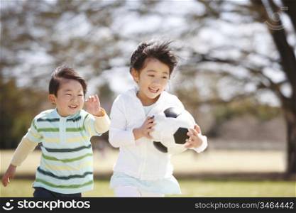 Japanese children playing soccer
