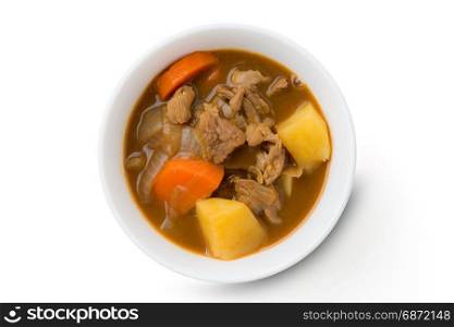 Japanese curry in a bowl isolated on white
