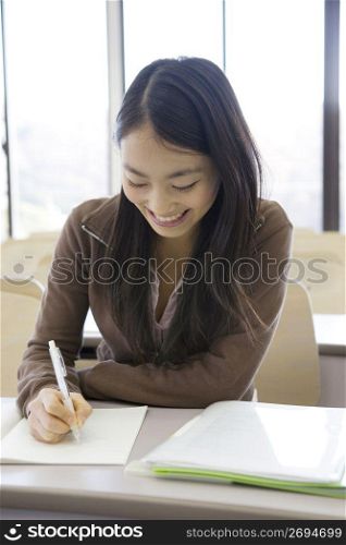 Japanese female student studying in a classroom