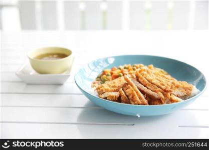 Japanese food Curry rice with fried pork on wood background