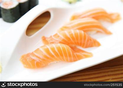 Japanese food Salmon Sushi set on wood background