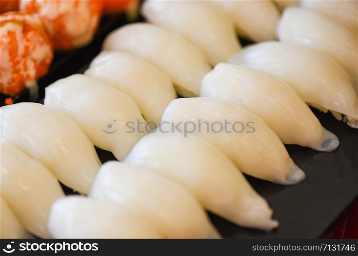 Japanese food sushi roll in the restaurant sushi menu set japanese cuisine fresh ingredients on tray , selective focus