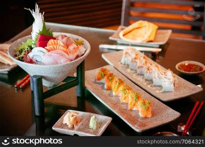Japanese fresh Sushi Sashimi set with various fish and seafood, beautiful dish decoration