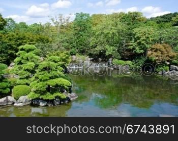 Japanese garden. Japanese garden with lake and waterfall