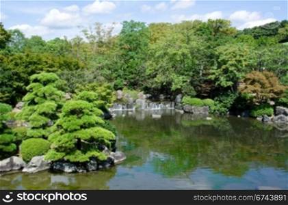 Japanese garden. Japanese garden with lake and waterfall