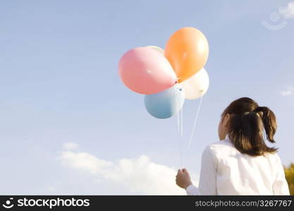 Japanese girl having balloons