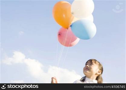Japanese girl having balloons