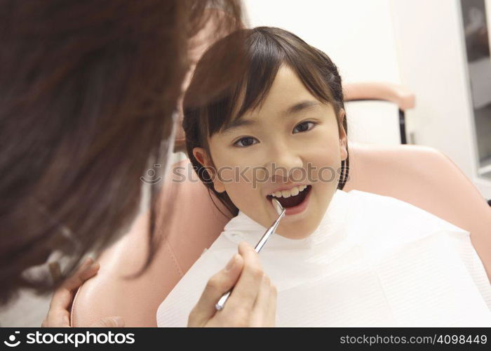 Japanese girl seeing a dentist