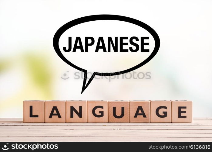 Japanese language lesson sign made of cubes on a table