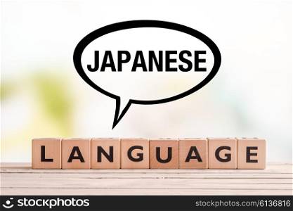 Japanese language lesson sign made of cubes on a table