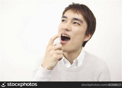 Japanese man caring his breath