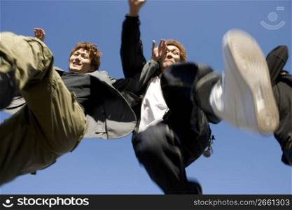 Japanese men jumping