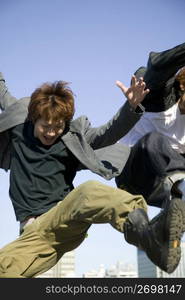 Japanese men jumping