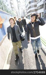 Japanese men walking on the street