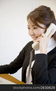 Japanese office lady talking with phone