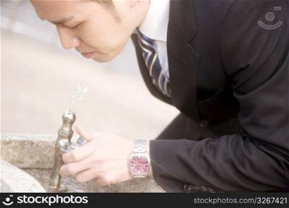 Japanese office worker a drinking water