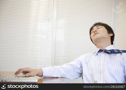 Japanese office worker having a break